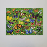 Complete puzzle with colourful butterfly pattern on a green background