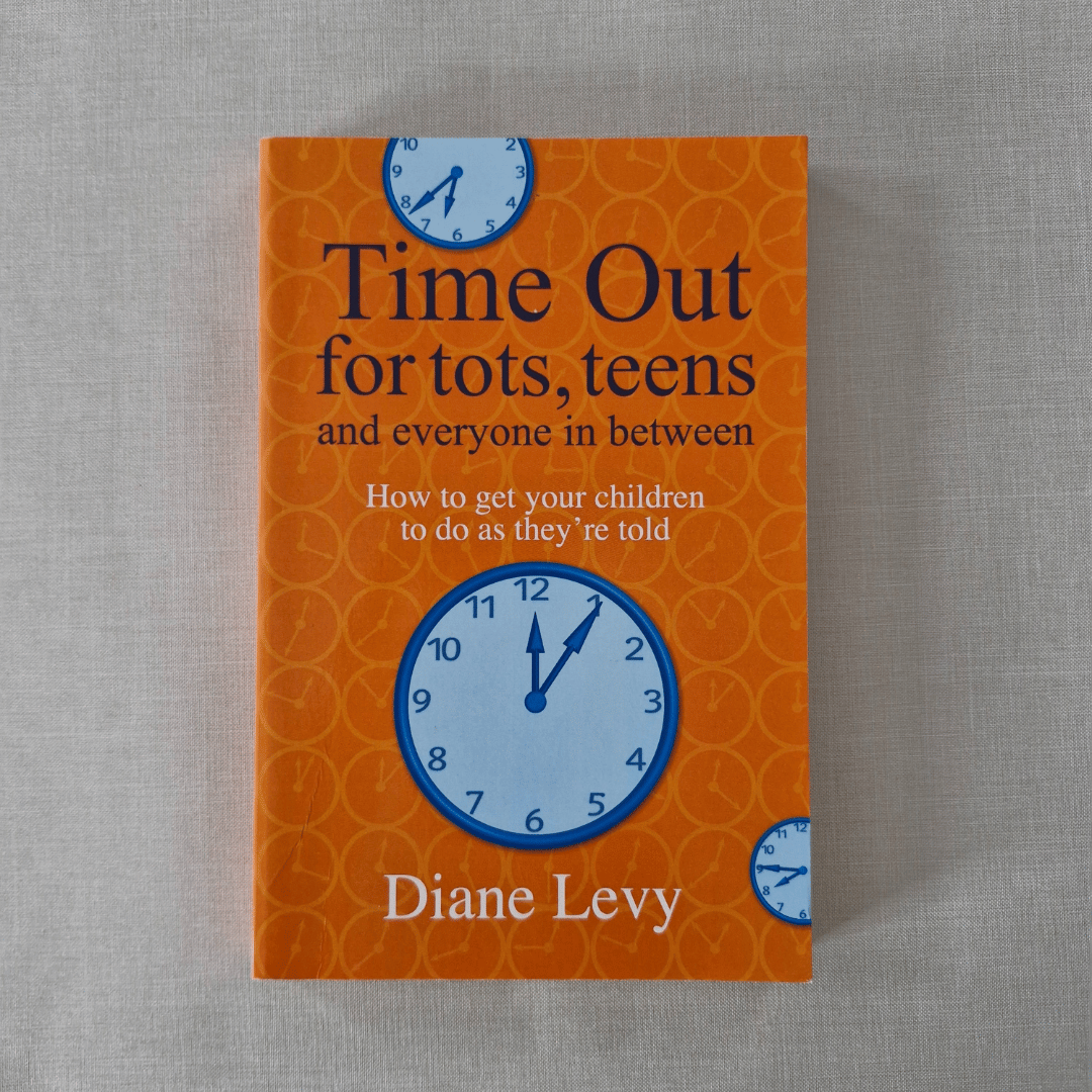 Book cover of 'Time Out for tots, teens and everyone in between' by Diane Levy on an orange background with blue clock faces.