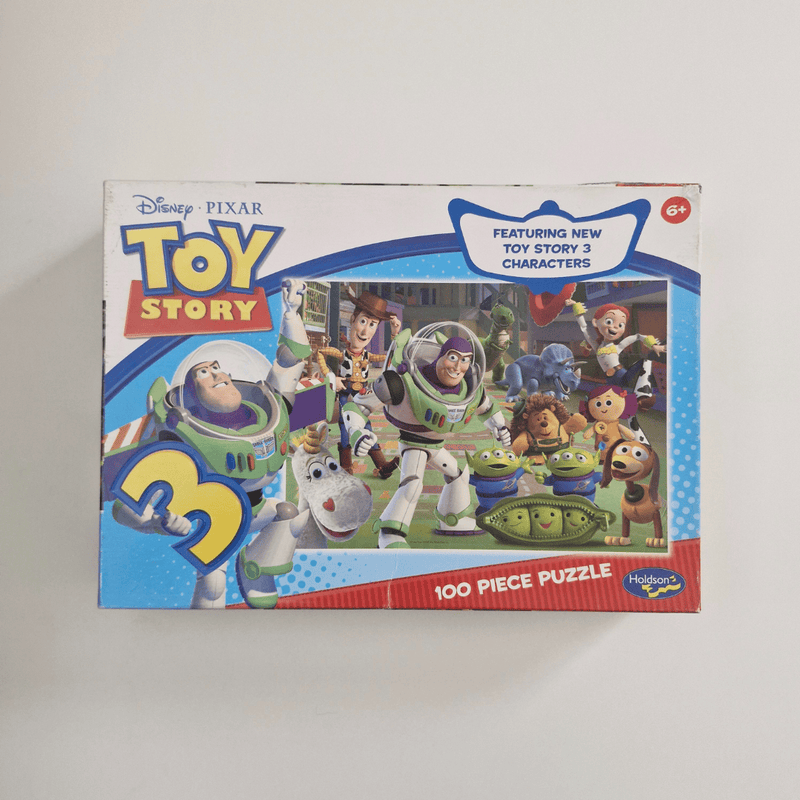 Toy Story 3 puzzle box with characters on a white background