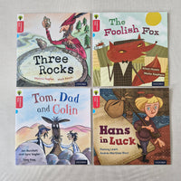 Four children's book covers on a grey background