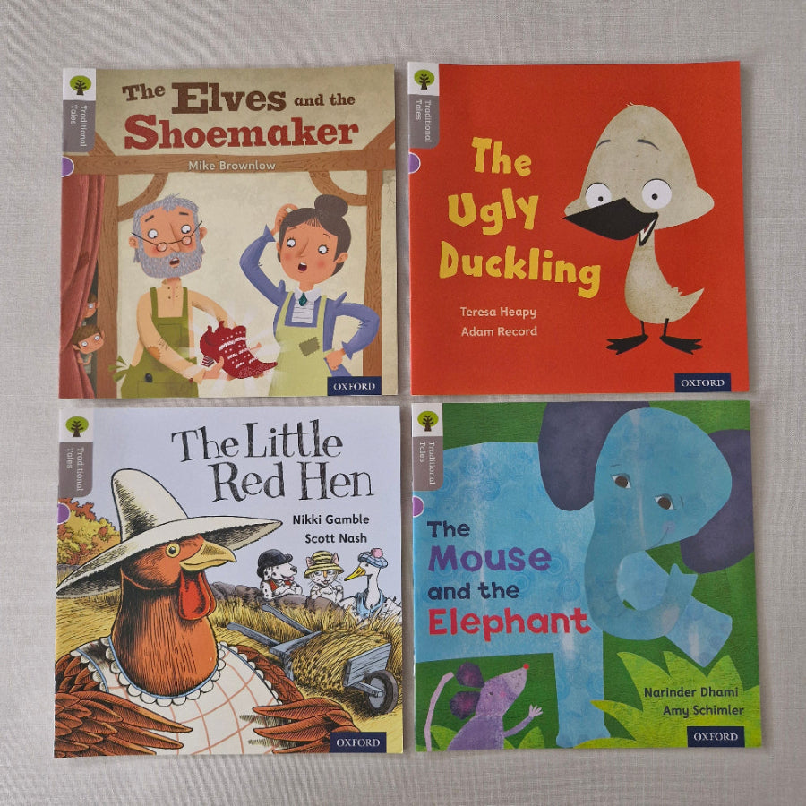 Four children's books with colourful covers on a grey background