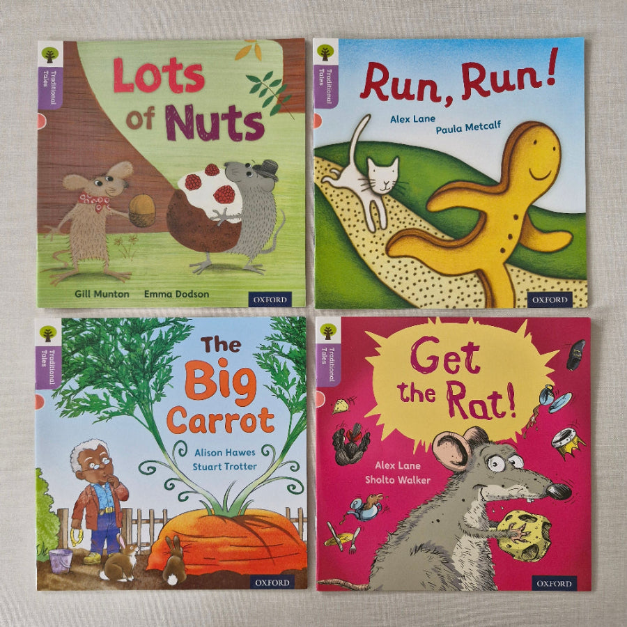 Four children's books with colourful covers on a textured surface
