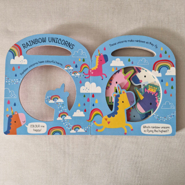 Children's book with colourful unicorn illustrations on a textured beige background