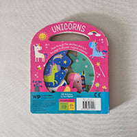 Unicorn-themed children's book on a light gray background