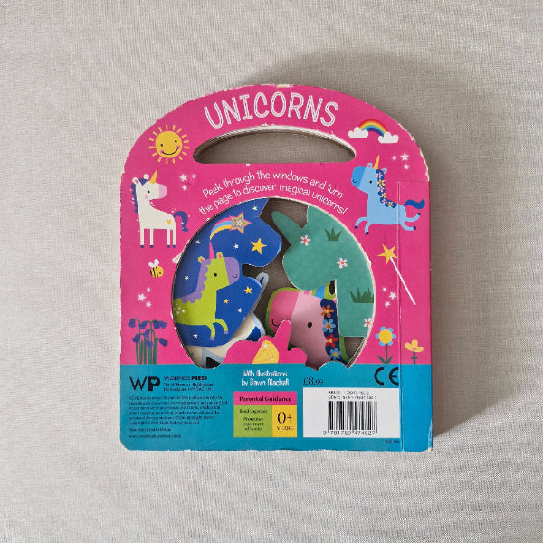 Unicorn-themed children's book on a light gray background