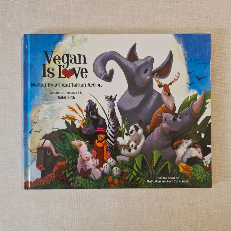 Book cover of 'Vegan Is Love' with illustrations of animals on a beige background