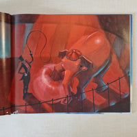 Book page with elephant in circus ring standing on a ball