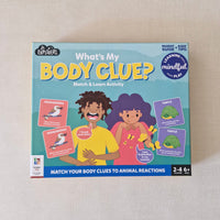 Board game box titled 'What's My Body Clue?' on a beige surface