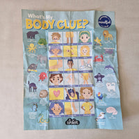 Educational children's book titled 'What's My Body Clue?' on a beige surface