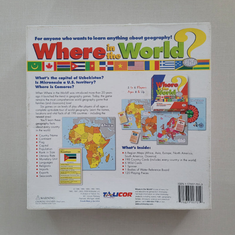 Back of the 'Where in the World?' geography game box by Talicor, showing game information, included maps and pieces, and a barcode on a light gray background.