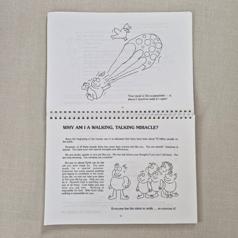 Sheet of paper with black and white illustrations and text on a beige background