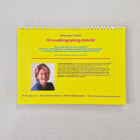 Yellow book back cover with text "why wasn't I told? I'm a walking talking miracle!" and a photo of the author Lisa McInnes-Smith on a gray background
