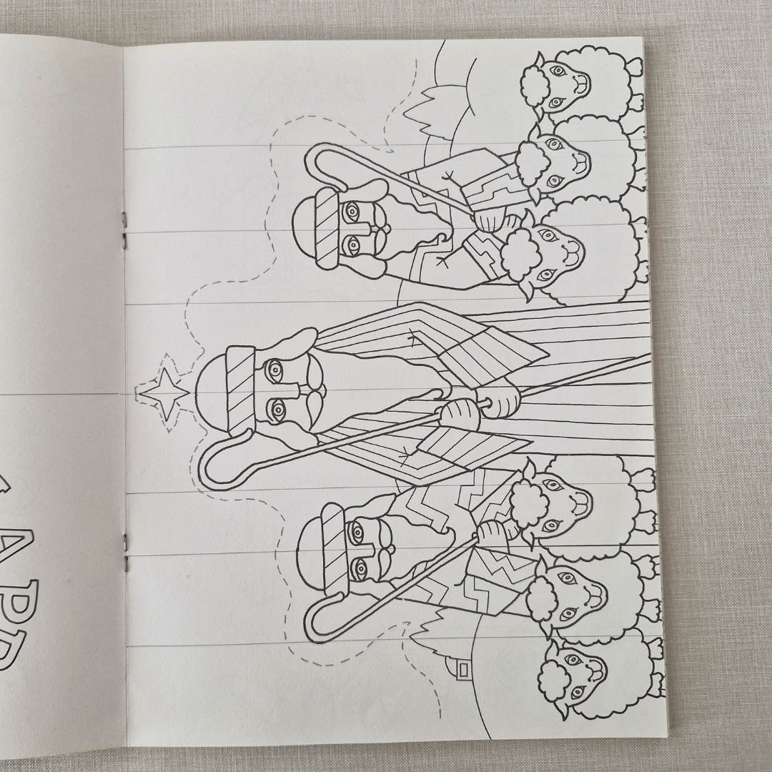 Colouring book page with a black and white illustration of shepherds and sheep on a textured surface.