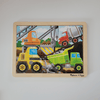 Children's puzzle with construction vehicles on a wooden frame, brand 'Melissa & Doug' visible.