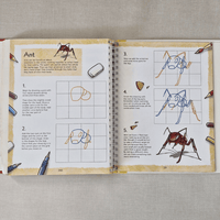 Open book with drawing instructions for an ant on a textured surface