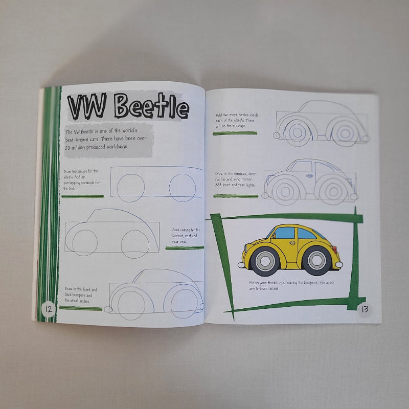 Open book with illustrations of a VW Beetle on a white background