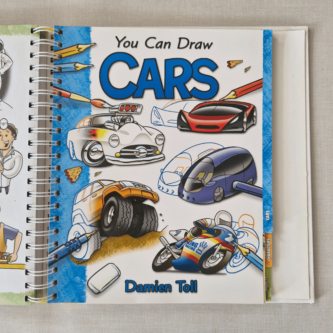 Book titled 'You Can Draw Cars' by Damien Toll with illustrations of cars on the cover.