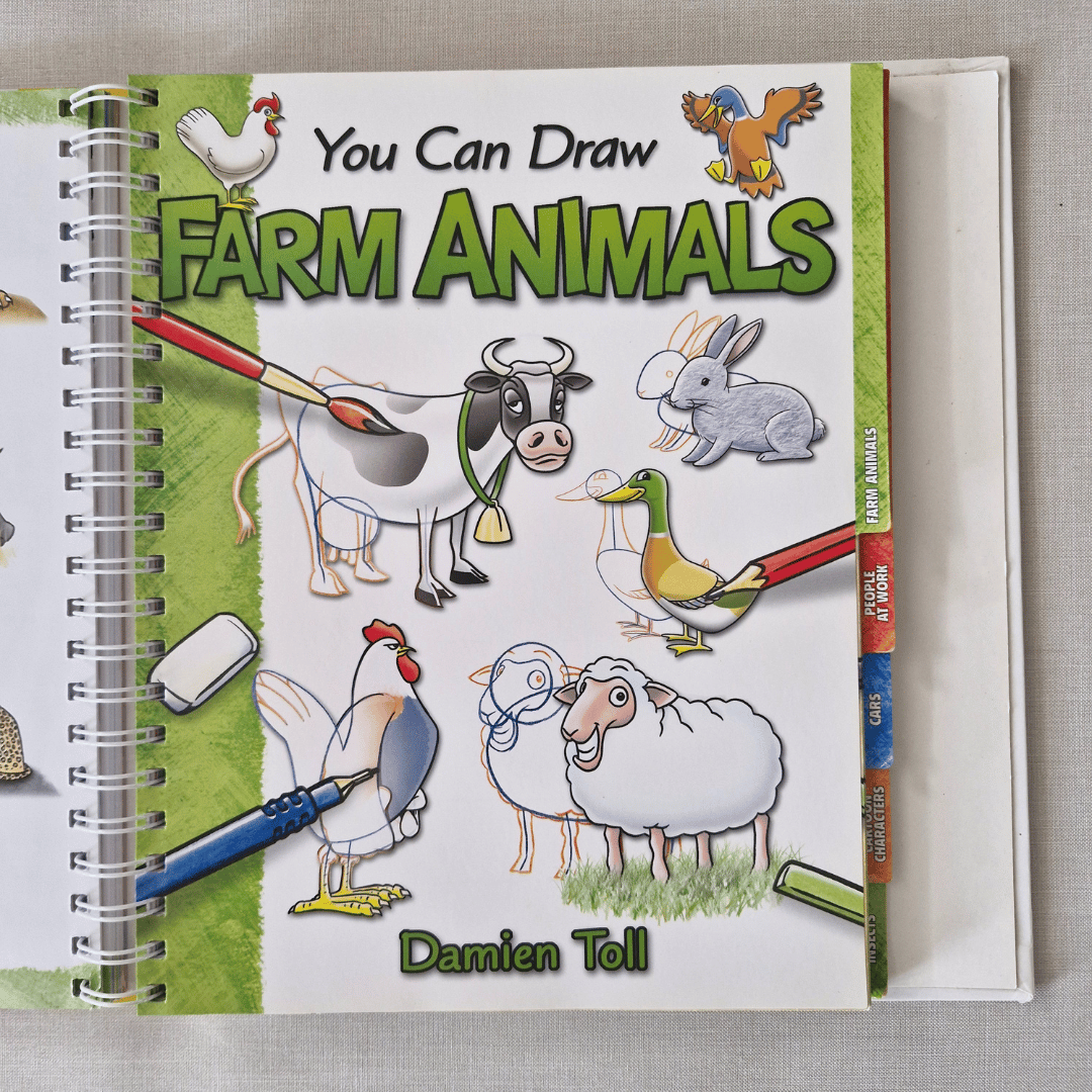 Book titled 'You Can Draw Farm Animals' by Damien Toll on a grey background
