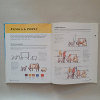 Open book with illustrations of animals and people on a plain background