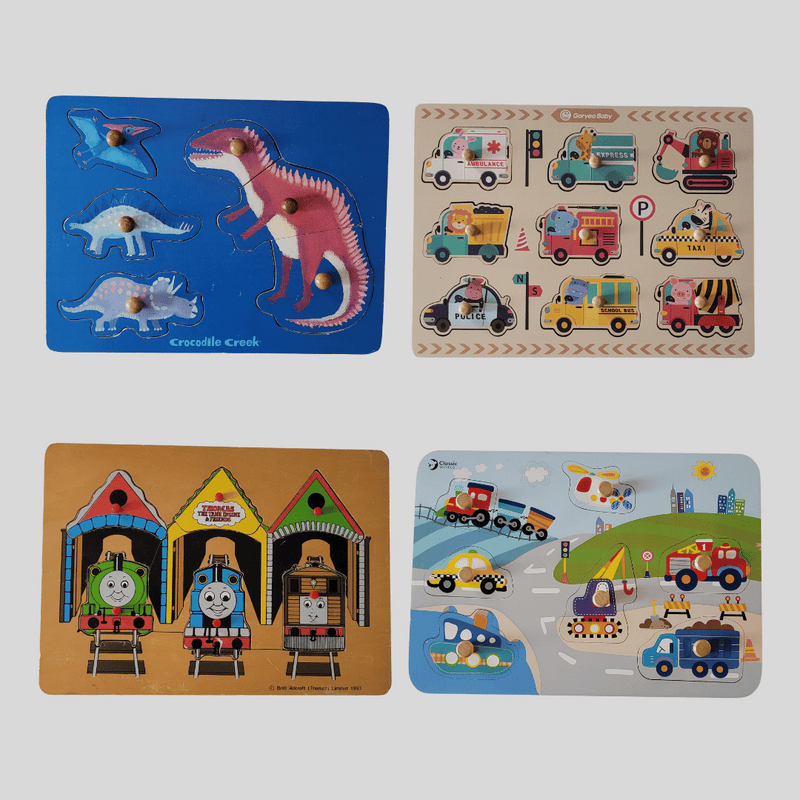 Set of four children's educational puzzles on a white background