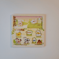 Children's educational puzzle with farm animals on a plain background