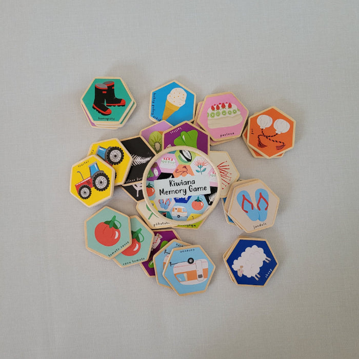 Hexagonal memory game cards with various designs on a light gray background