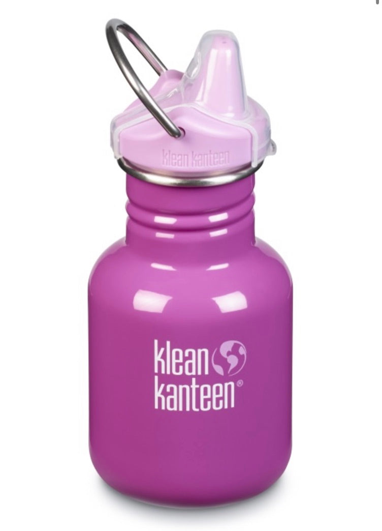 A pink Klean Kanteen stainless steel sippy bottle with a spout and metal loop.